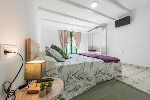 Posteľ alebo postele v izbe v ubytovaní Bettatur Apartaments Rera Sant Domenech