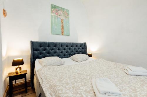 Кровать или кровати в номере Boutique apartments