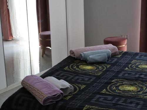 Ένα ή περισσότερα κρεβάτια σε δωμάτιο στο PORTACAPUANA Guest House