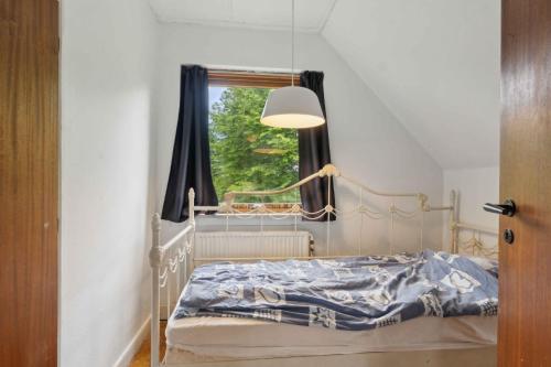 Ένα ή περισσότερα κρεβάτια σε δωμάτιο στο Cozy Holiday Apartment In Rødvig Stevns