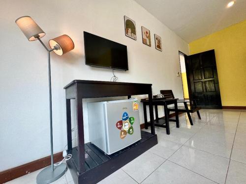 TV a/nebo společenská místnost v ubytování KK Hotel