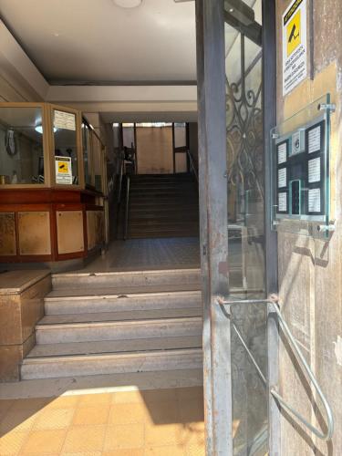 an entrance to a building with stairs and a door at Nynphea Appartament's in Naples