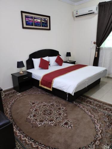 Кровать или кровати в номере Al Eairy Apartments - Hail 3