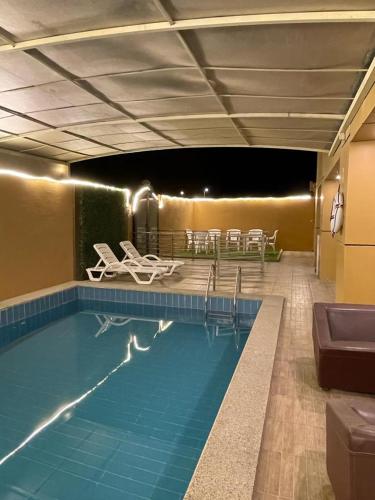 Bazén v ubytování Open Hotel Dammam nebo v jeho okolí