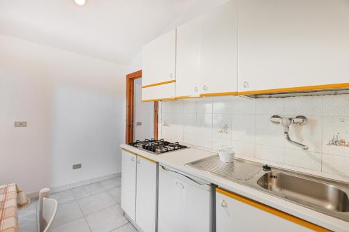 Kuchyň nebo kuchyňský kout v ubytování Podere Al Buraccio - Elba Affitti