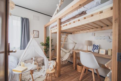 Postel nebo postele na pokoji v ubytování AKIYATO DATE DREAM DATE home