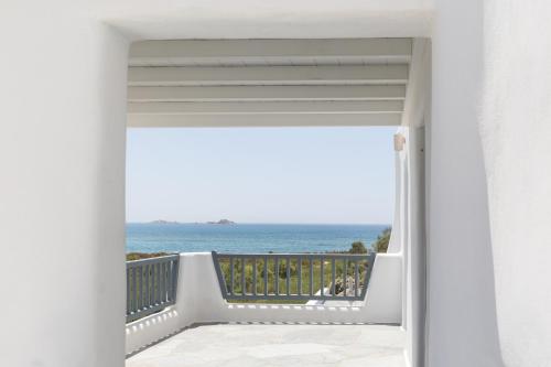a view of the ocean from the balcony of a house at Ammilia Villa Naxos in Naxos Chora