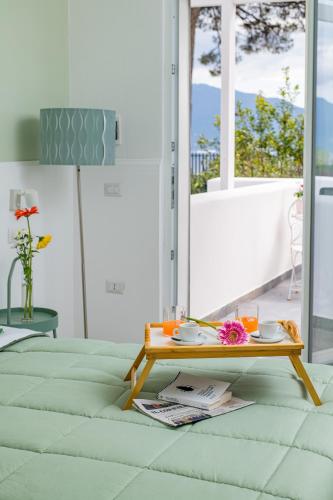 a coffee table sitting on a couch in a living room at Vigna delle Rose in Trecase