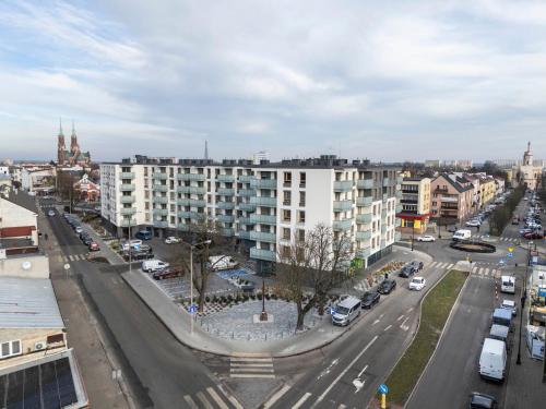 an aerial view of a city street with a building at Stylowy apartament z balkonem i panoramą miasta in Siedlce