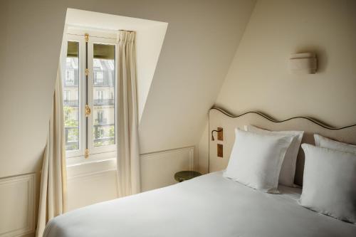 Katil atau katil-katil dalam bilik di Léon Hôtel