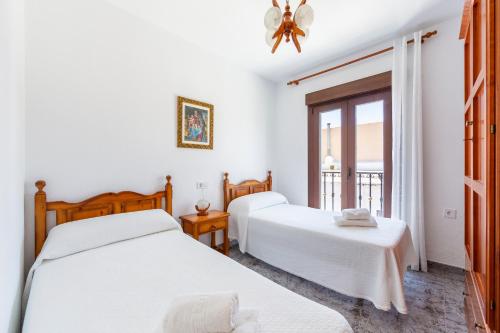 Ένα ή περισσότερα κρεβάτια σε δωμάτιο στο Villa Cruz en Fernán Pérez