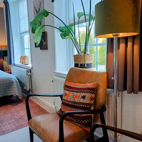 Area soggiorno di Bed & Brasserie Het Kosthuys