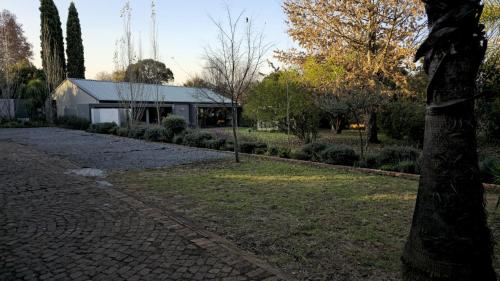Κήπος έξω από το GrootBoom Guest Rooms