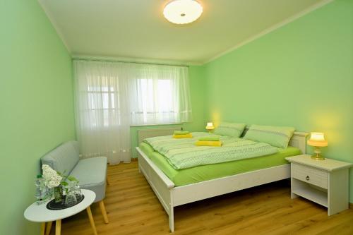 Katil atau katil-katil dalam bilik di Ferienhaus Weitblick