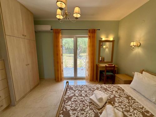 Ένα ή περισσότερα κρεβάτια σε δωμάτιο στο Thomas Apartments