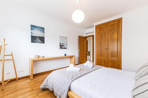 Voodi või voodid majutusasutuse Joia Da Rocha By Algarve Golden Properties toas