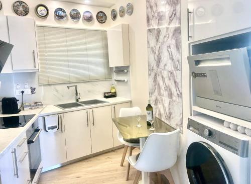 Kuchyňa alebo kuchynka v ubytovaní Apartment Xenia