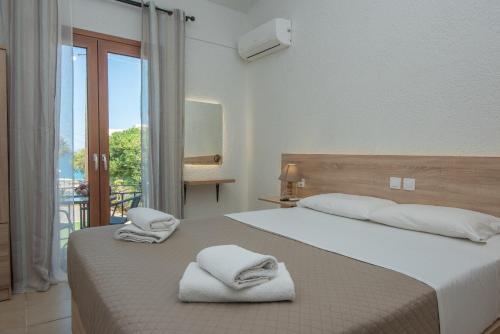 Katil atau katil-katil dalam bilik di Athina Villas
