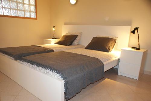 Postel nebo postele na pokoji v ubytování Vila da Praia 7D Alvor