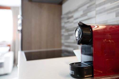 a coffee maker sitting on top of a counter at ambra in Aosta
