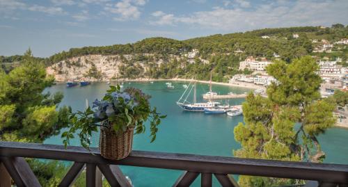 a view of a harbor with boats in the water at Liadromia Hotel in Patitiri