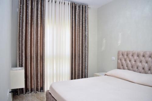 Ένα ή περισσότερα κρεβάτια σε δωμάτιο στο San Pietro Seaside Stay 283