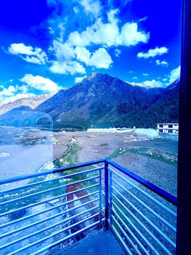 a balcony with a view of a mountain at J C Legacy in Chitkul