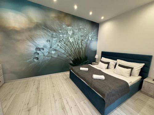 Ένα ή περισσότερα κρεβάτια σε δωμάτιο στο Reforma Apartman