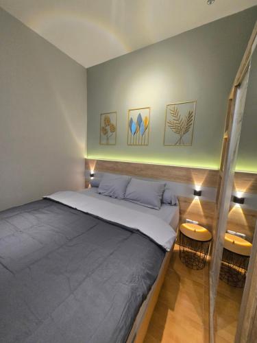 Postel nebo postele na pokoji v ubytování Rebahan Stay