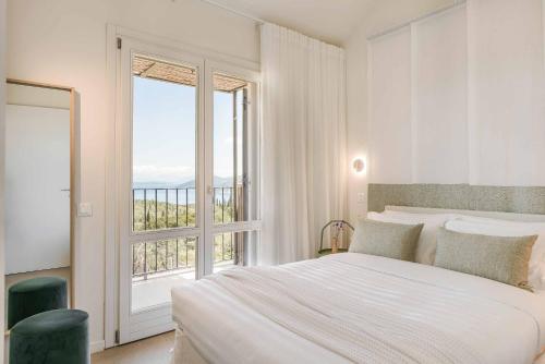 Ένα ή περισσότερα κρεβάτια σε δωμάτιο στο Villa Cielo