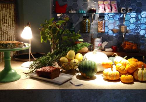 a table topped with lots of different types of fruits and vegetables at The Crown in Woodstock