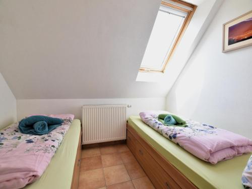 Ένα ή περισσότερα κρεβάτια σε δωμάτιο στο Eva