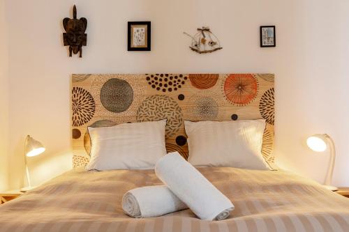 Postel nebo postele na pokoji v ubytování Authentique 2 chambres, Hyper centre, french Corner