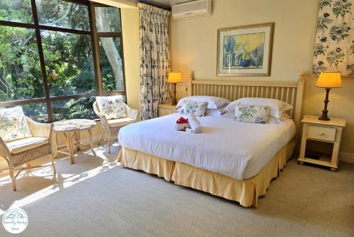 Ένα ή περισσότερα κρεβάτια σε δωμάτιο στο Villa G20 - Selborne Golf Estate