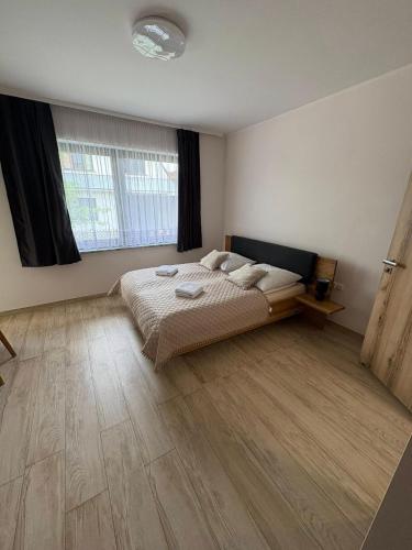 Postel nebo postele na pokoji v ubytování Apartament Miś