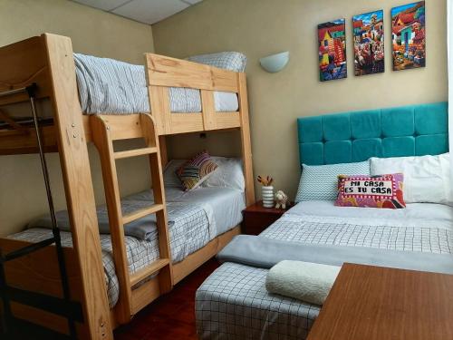 Postel nebo postele na pokoji v ubytování Sweet Home tu hogar en Cusco