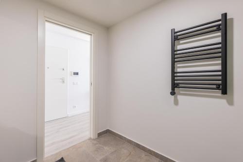 a hallway with a door leading into a room at Peniche Hideout in Peniche