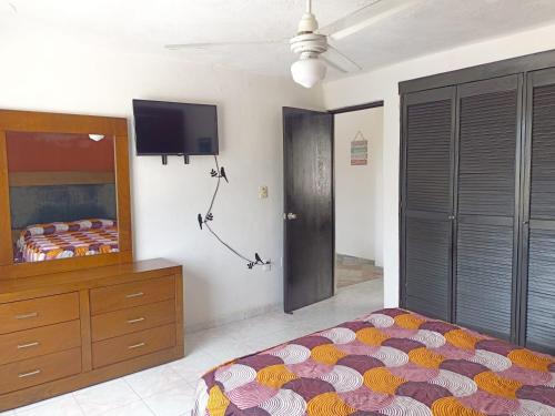 Katil atau katil-katil dalam bilik di Apartamento céntrico en Colima