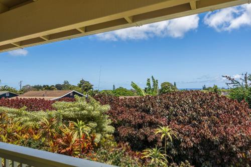 a view of a garden from a balcony at 2 Mi to Hana Hwy Haiku Home with Ocean Views! in Haiku