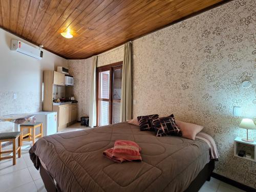 Ένα ή περισσότερα κρεβάτια σε δωμάτιο στο Residencial Borges Canela