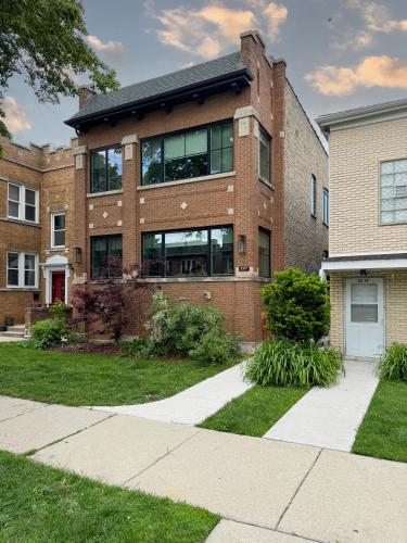 a large brick building with a lot of windows at Ace Properties in Chicago