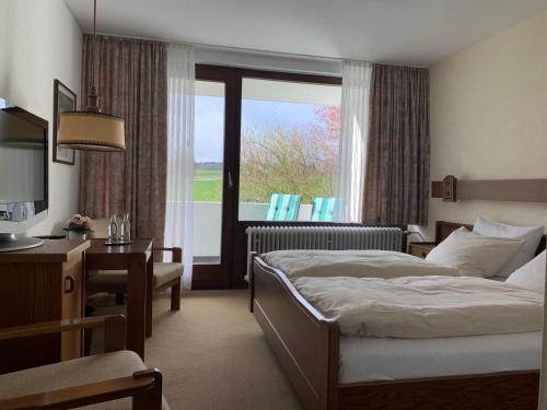 Postel nebo postele na pokoji v ubytování Hotel Haus Eggewald
