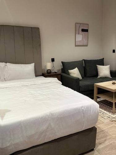 Ένα ή περισσότερα κρεβάτια σε δωμάτιο στο Great hosting studio