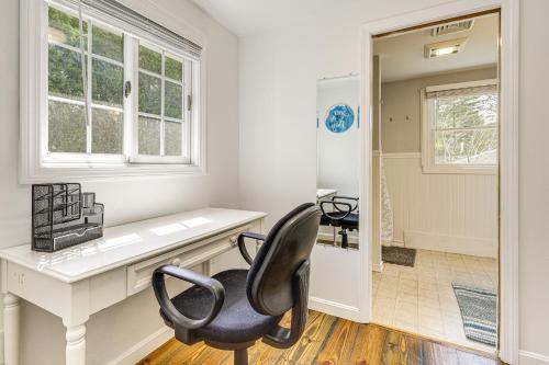 a home office with a desk and a chair at 4 Mi to Beach Cape Cod Retreat in Mashpee! in Mashpee