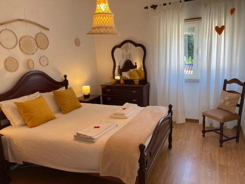 Ένα ή περισσότερα κρεβάτια σε δωμάτιο στο Quinta do Carvalheiro