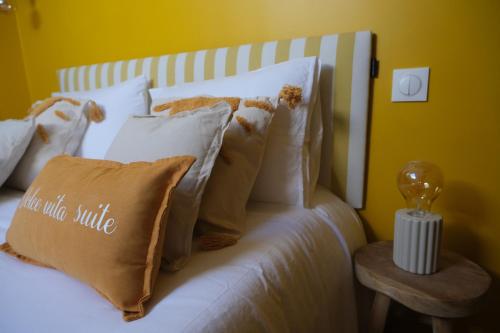 Ένα ή περισσότερα κρεβάτια σε δωμάτιο στο Dolcevita Suite - Signature italienne avec spa et filet