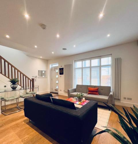 Χώρος καθιστικού στο The Mews house in Muswell Hill with private parking