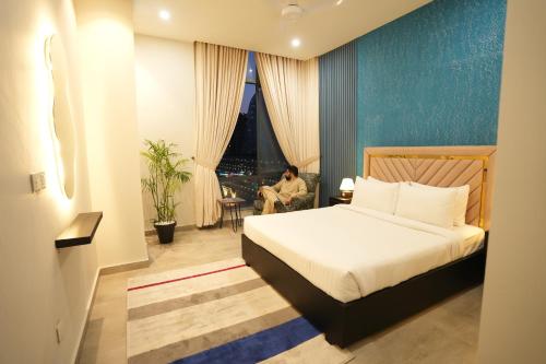 Кровать или кровати в номере 3BHK Serenity Suite By Skypark One