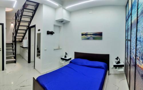 Ένα ή περισσότερα κρεβάτια σε δωμάτιο στο Roccaforte House - Palermo