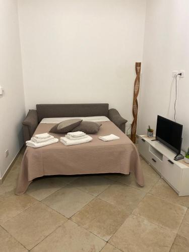 Ένα ή περισσότερα κρεβάτια σε δωμάτιο στο Sunflower Holiday Home